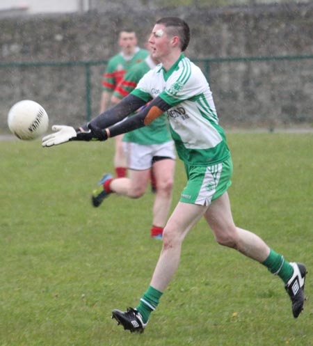 Action from the reserve division 3 senior game against Carndonagh.