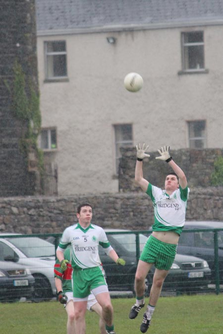 Action from the reserve division 3 senior game against Carndonagh.