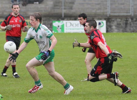 Action from the reserve division 3 senior game against Naomh Bríd.