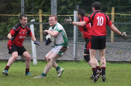 Action from the reserve division 3 senior game against Naomh Bríd.