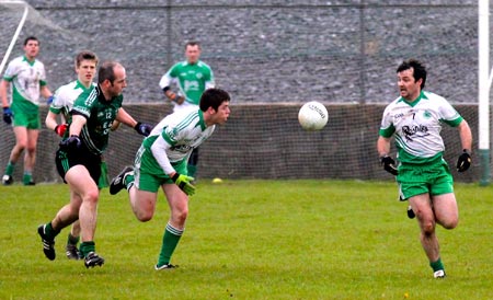 Action from the  division 3 senior game against Naomh Bríd.