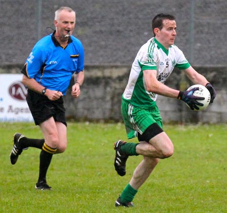 Action from the  division 3 senior game against Naomh Bríd.