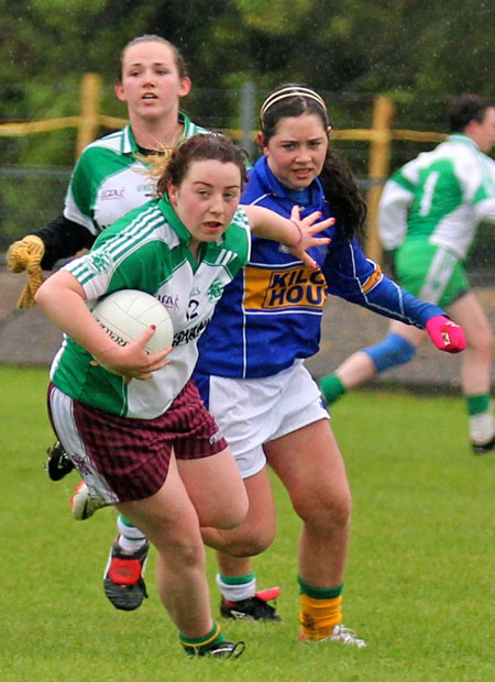Action from the ladies senior match between Aodh Ruadh and Kilcar.