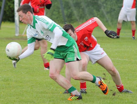 Action from the reserve division 3 senior game against Naomh Colmcille.