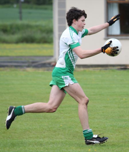 Action from the reserve division 3 senior game against Naomh Colmcille.