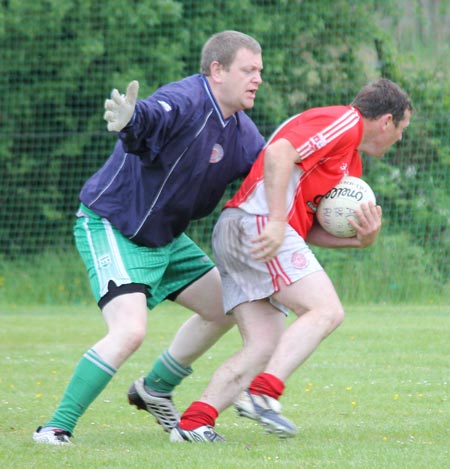 Action from the reserve division 3 senior game against Naomh Colmcille.