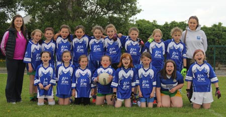 Action from the ladies under 10 and under 8 match between Aodh Ruadh and Four Masters.