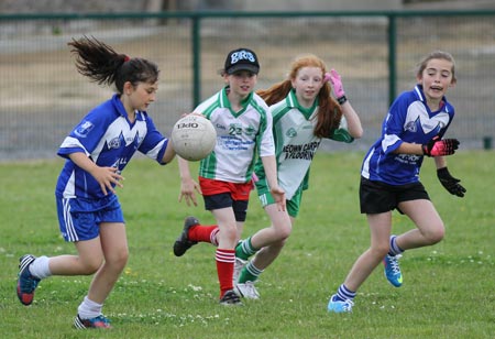 Action from the ladies under 10 and under 8 match between Aodh Ruadh and Four Masters.