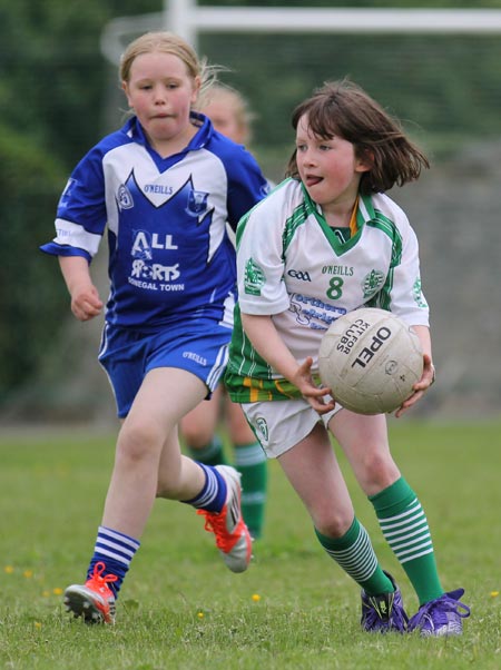 Action from the ladies under 10 and under 8 match between Aodh Ruadh and Four Masters.