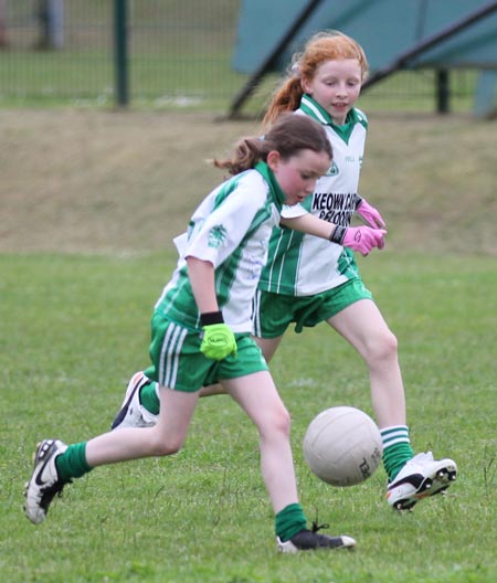 Action from the ladies under 10 and under 8 match between Aodh Ruadh and Four Masters.