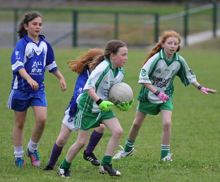 Action from the ladies under 10 and under 8 match between Aodh Ruadh and Four Masters.