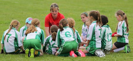 Action from the ladies under 10 and under 8 match between Aodh Ruadh and Four Masters.