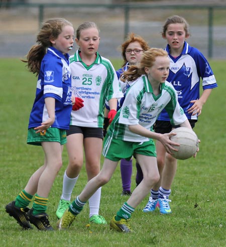 Action from the ladies under 10 and under 8 match between Aodh Ruadh and Four Masters.