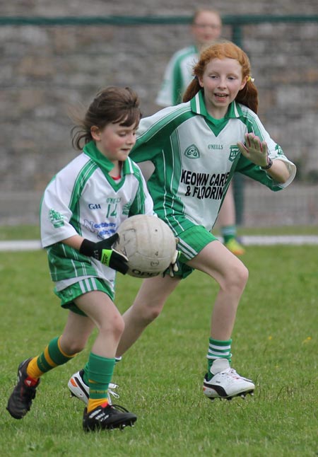 Action from the ladies under 10 and under 8 match between Aodh Ruadh and Four Masters.