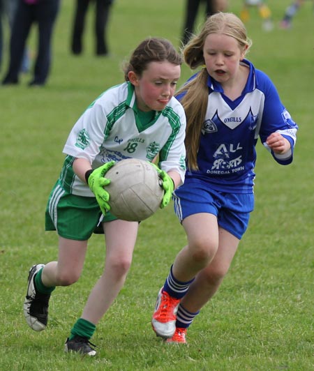 Action from the ladies under 10 and under 8 match between Aodh Ruadh and Four Masters.