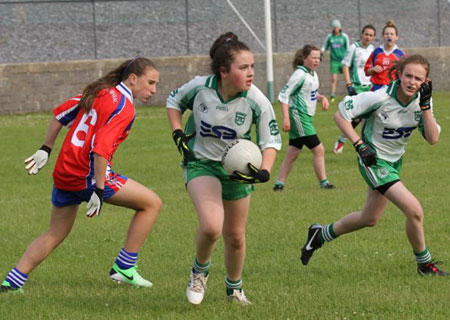 Action from the ladies under 14 match between Aodh Ruadh and New York.