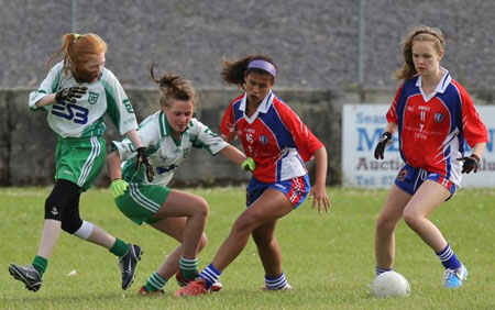 Action from the ladies under 14 match between Aodh Ruadh and New York.