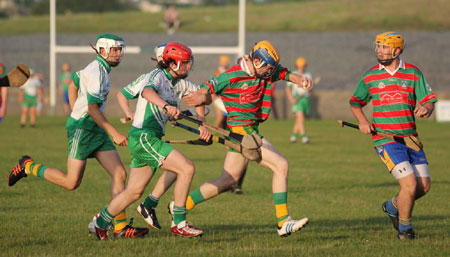 Action from the minor hurling championshiop game against Burt.