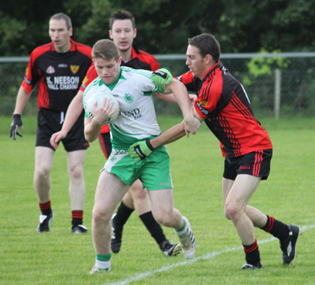 Action from the division three reserve league game between Aodh Ruadh and Red Hugh's.