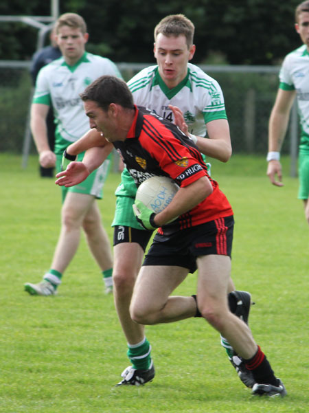 Action from the division three reserve league game between Aodh Ruadh and Red Hugh's.