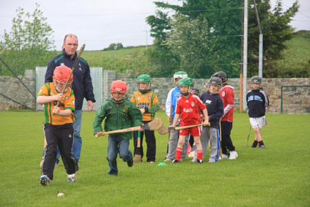 Under 10 hurling blitz action.