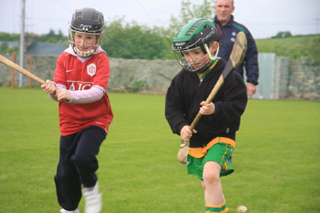 Under 10 hurling blitz action.