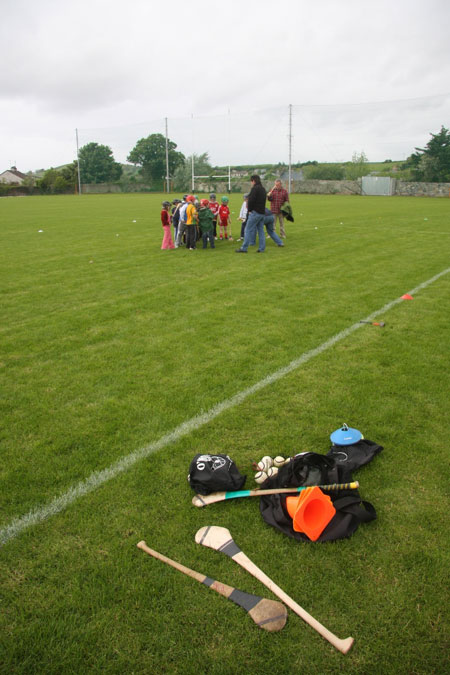 Under 10 hurling blitz action.