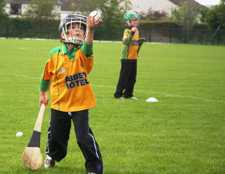 Under 10 hurling blitz action.