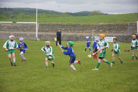 Under 10 hurling blitz action.