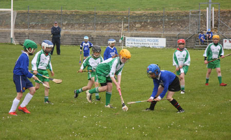 Under 10 hurling blitz action.