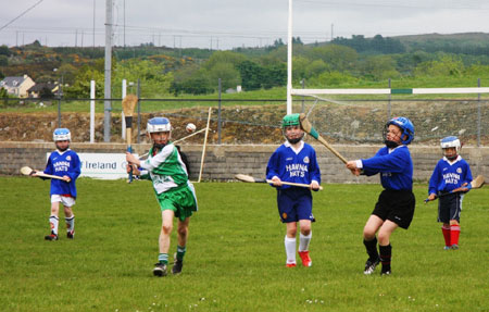 Under 10 hurling blitz action.