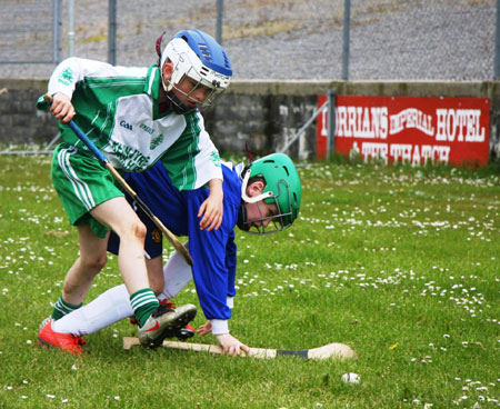 Under 10 hurling blitz action.