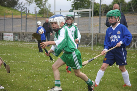 Under 10 hurling blitz action.