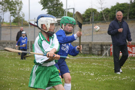 Under 10 hurling blitz action.