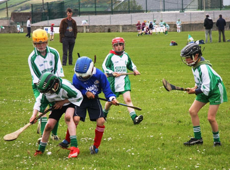 Under 10 hurling blitz action.