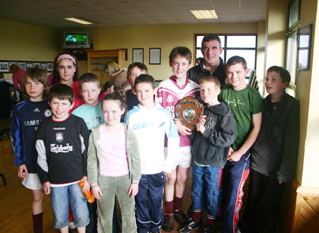 Tom Daly with the victorious Letterkenny Gaels team.