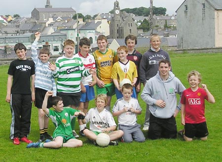 A group of kids who took part in the obstacle course in the school field.