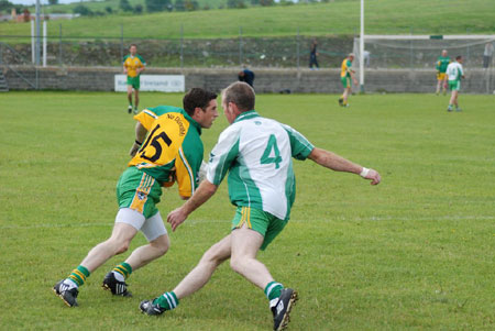 Action from Aodh Ruadh v Downings game.