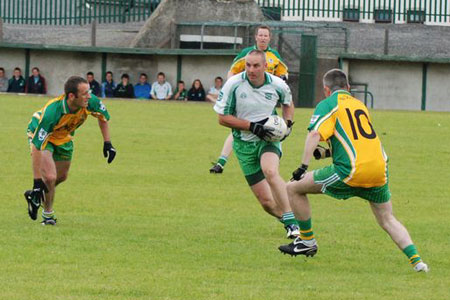 Action from Aodh Ruadh v Downings game.