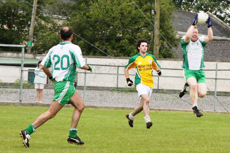 Action from Aodh Ruadh v Downings game.