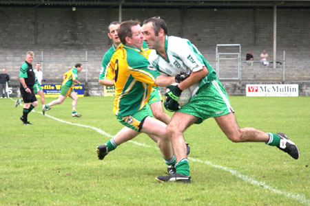 Action from Aodh Ruadh v Downings game.