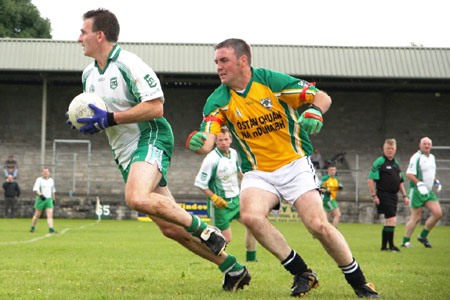 Action from Aodh Ruadh v Downings game.