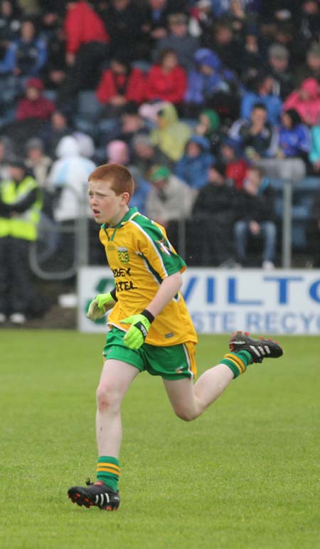 Aodh Ruadh's Shane McGrath plays the half-time mini-games at Breffni park.