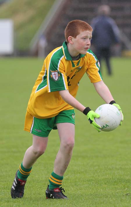Aodh Ruadh's Shane McGrath plays the half-time mini-games at Breffni park.