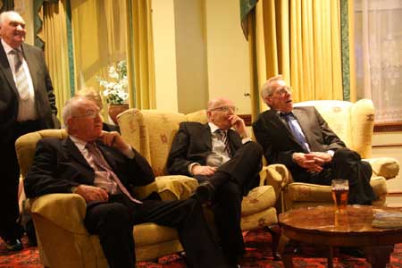 Sean McCormack (standig) keeps a close eye on proceedings as John 'Spud' Murphy, Barney Drummond and Gerry Lappin watch the video of the 1984 dinner dance.