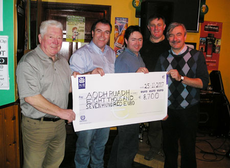 Mick McGrath, far right, presents a cheque for 8,700 to members of Aodh Ruadh Bord na nÓg (l-r): Jim Kane, Chairman, Bord na nÓg, Eunan Doyle, Finance Officer, Bord na nÓg, John Hughes, Secretary, Bord na nÓg and Terrence McShea, Aodh Ruadh Chairman.