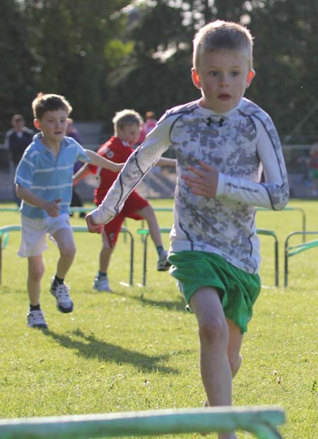 Action from the 2011 community games in Father Tierney Park.