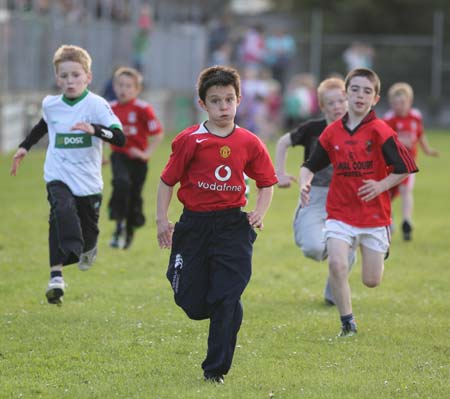 Action from the 2011 community games in Father Tierney Park.