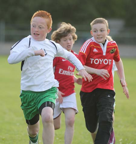 Action from the 2011 community games in Father Tierney Park.