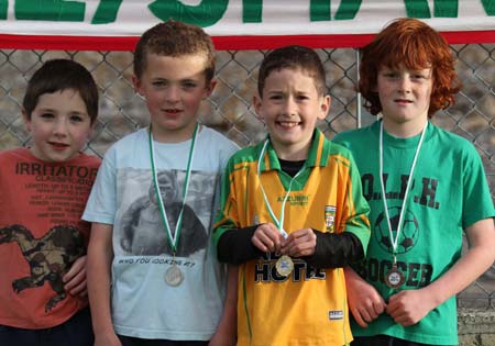 Action from the 2011 community games in Father Tierney Park.